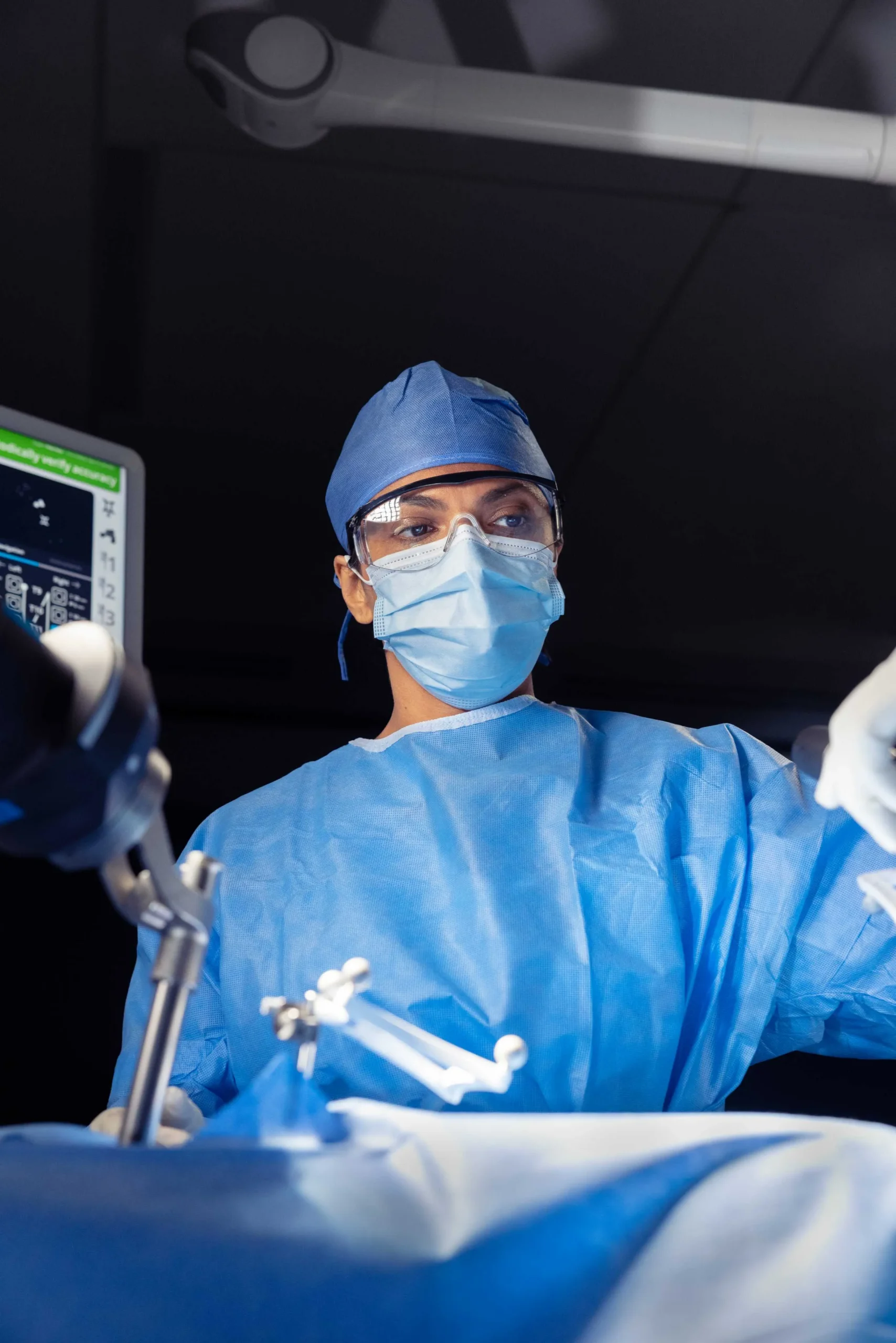 Surgeon performing robotic surgery