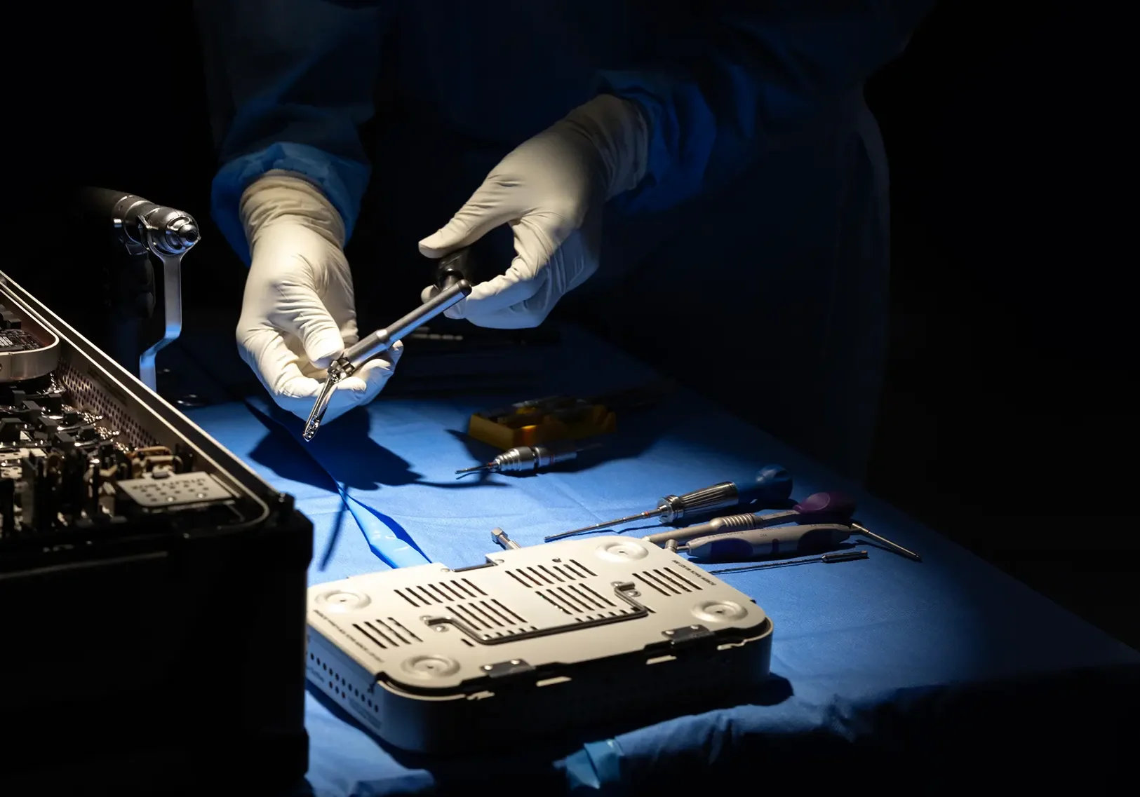 Surgeon handling surgical tools